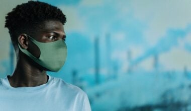 Young man with protective mask on his face